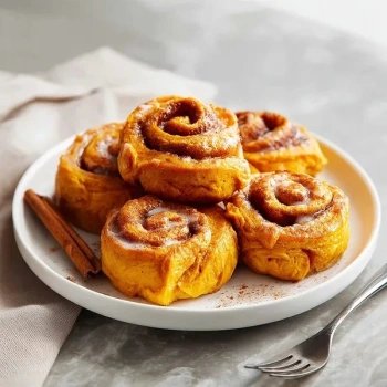 Perfectly cooked Pumpkin Spice Cinnamon Rolls served and ready to eat - final result